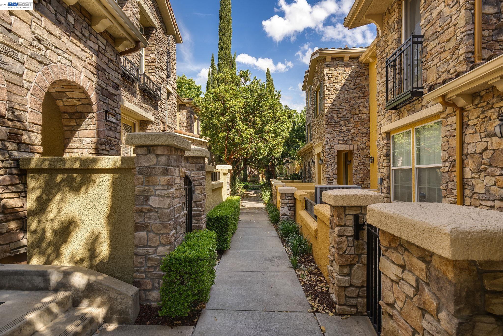 4653 Rimini Court Dublin, CA 94568 - Photo 41 of 44 a view of a pathway along with buildings