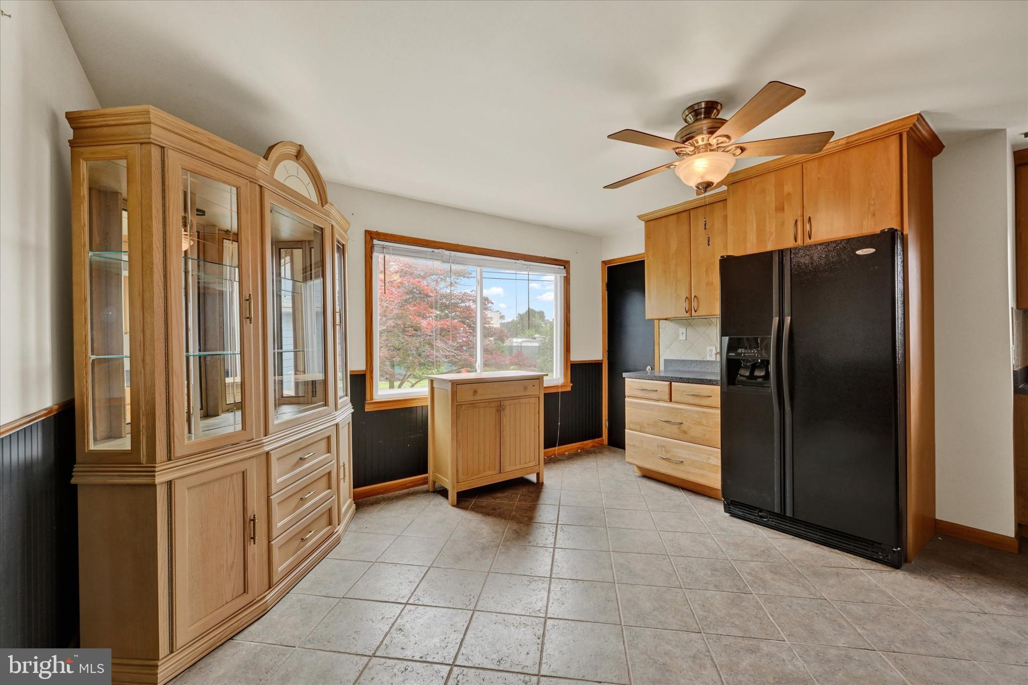 2622 Sparrows Point Road Baltimore, MD 21219 - Photo 5 of 15 a kitchen with a refrigerator and microwave