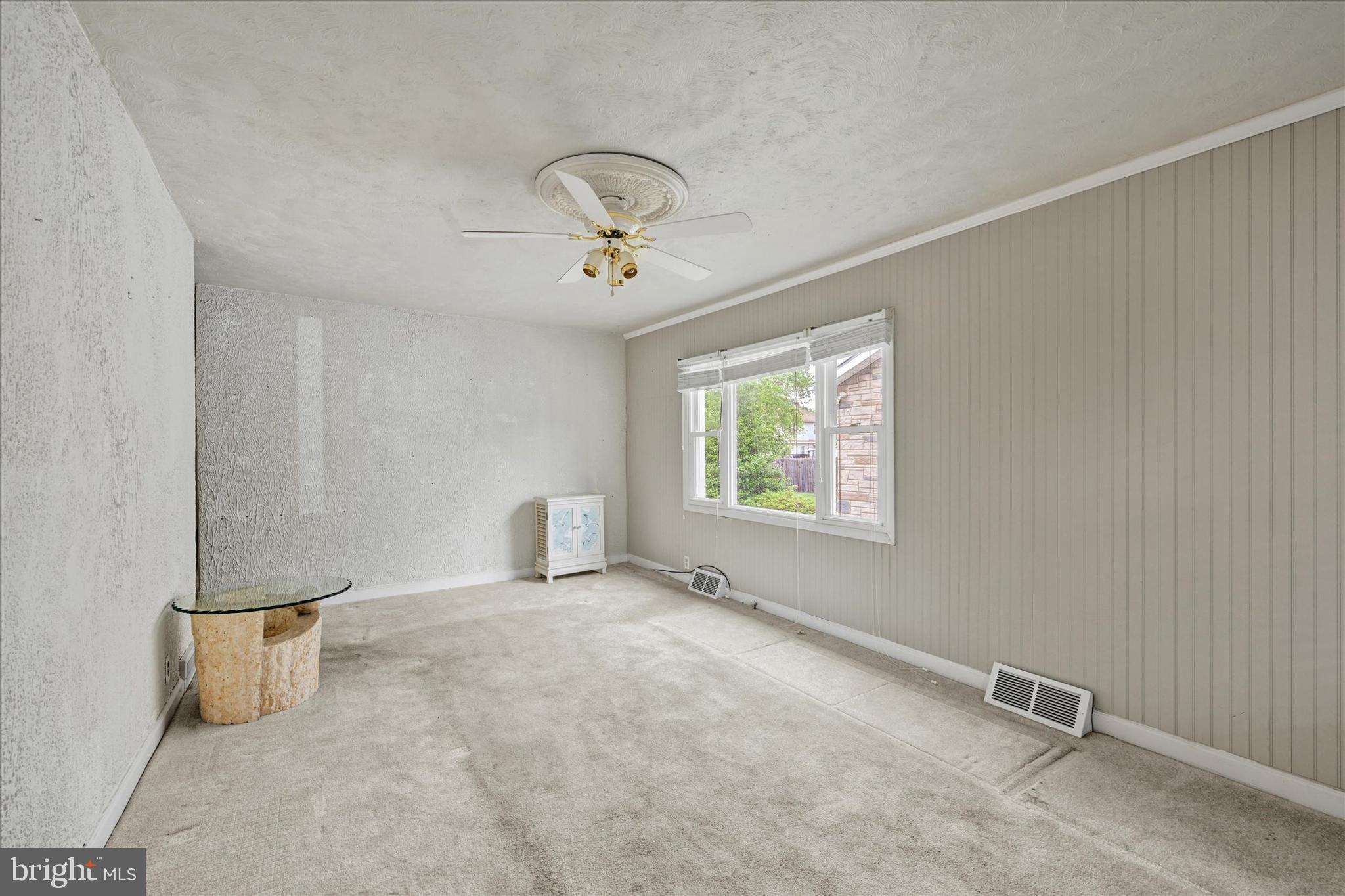 2622 Sparrows Point Road Baltimore, MD 21219 - Photo 7 of 15 a view of an empty room with a window