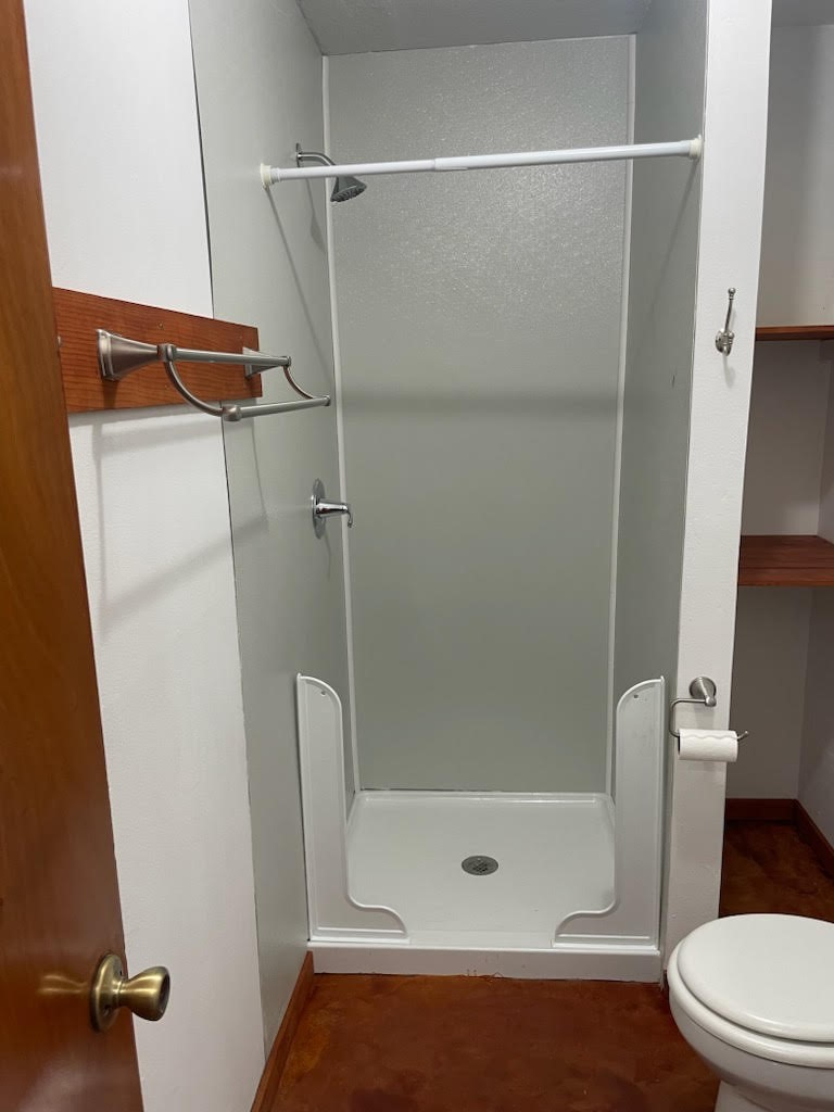 11357 Gil Rodriguez Loop Houston, TX 77075 - Photo 7 of 8 a bathroom with a shower and a toilet