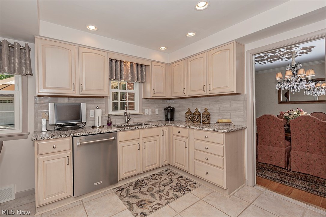 2415 Fenwick Road University Heights, OH 44118 - Photo 9 of 35 Enjoy cooking in this custom kitchen with granite countertops.