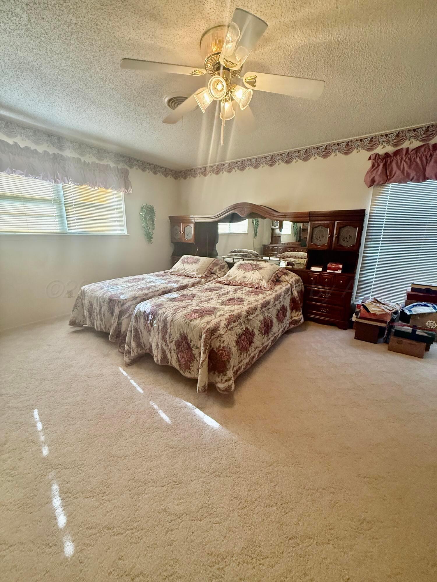 315 Coronado Street Fritch, TX 79036 - Photo 7 of 11 Primary Bedroom