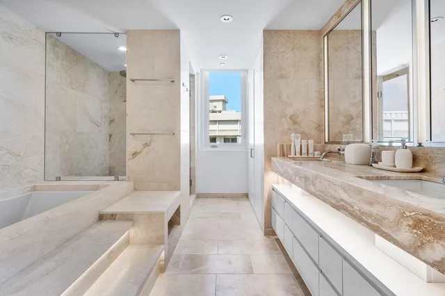 a bathroom with a sink a toilet and a bathtub