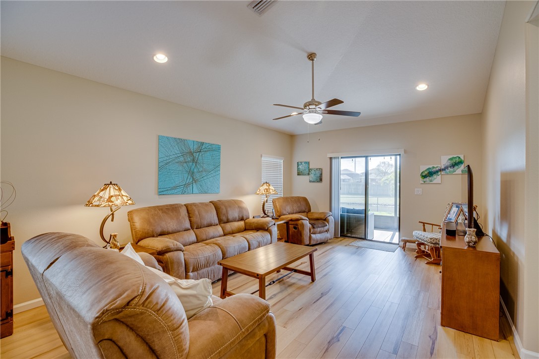 2965 Louetta Circle Melbourne, FL 32901 - Photo 14 of 36 a living room with furniture and wooden floor