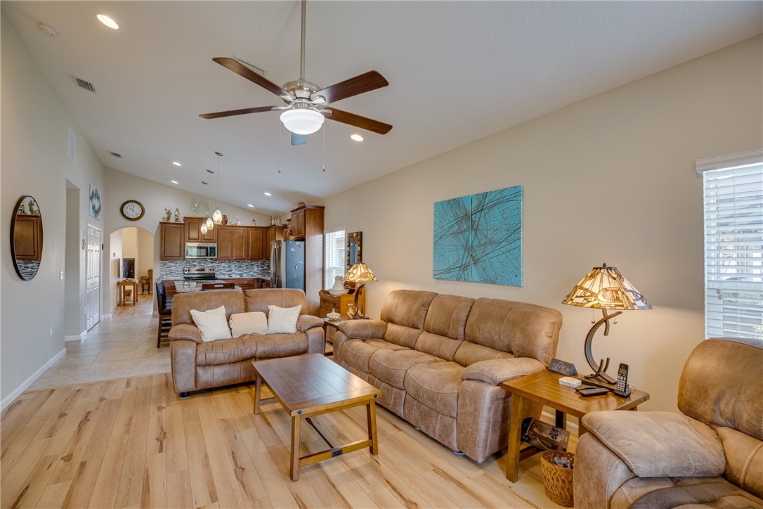 2965 Louetta Circle Melbourne, FL 32901 - Photo 17 of 36 a living room with furniture and a large window