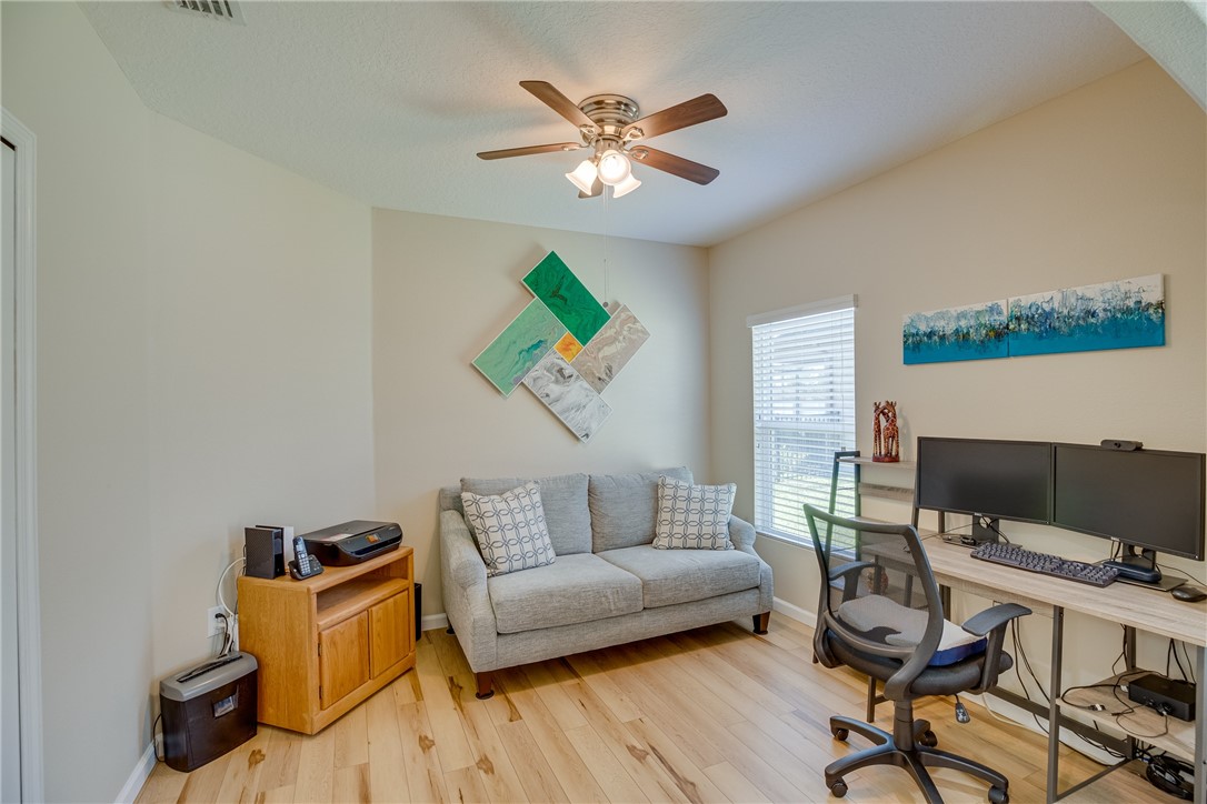 2965 Louetta Circle Melbourne, FL 32901 - Photo 21 of 36 a living room with furniture and a window