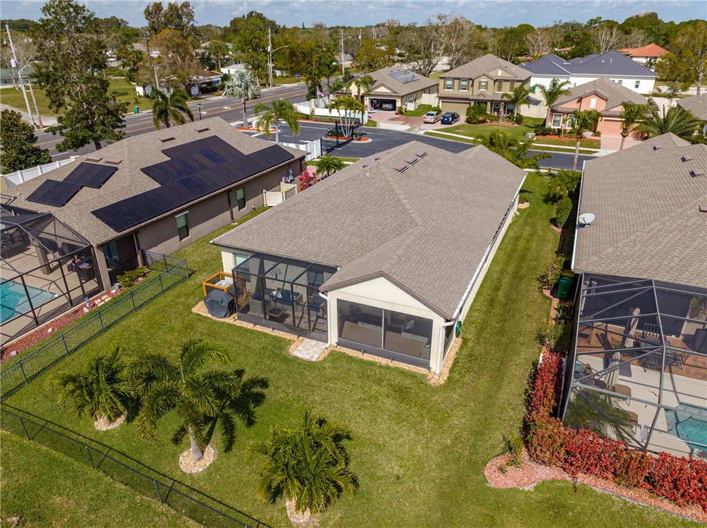 2965 Louetta Circle Melbourne, FL 32901 - Photo 36 of 36 an aerial view of a house with a garden