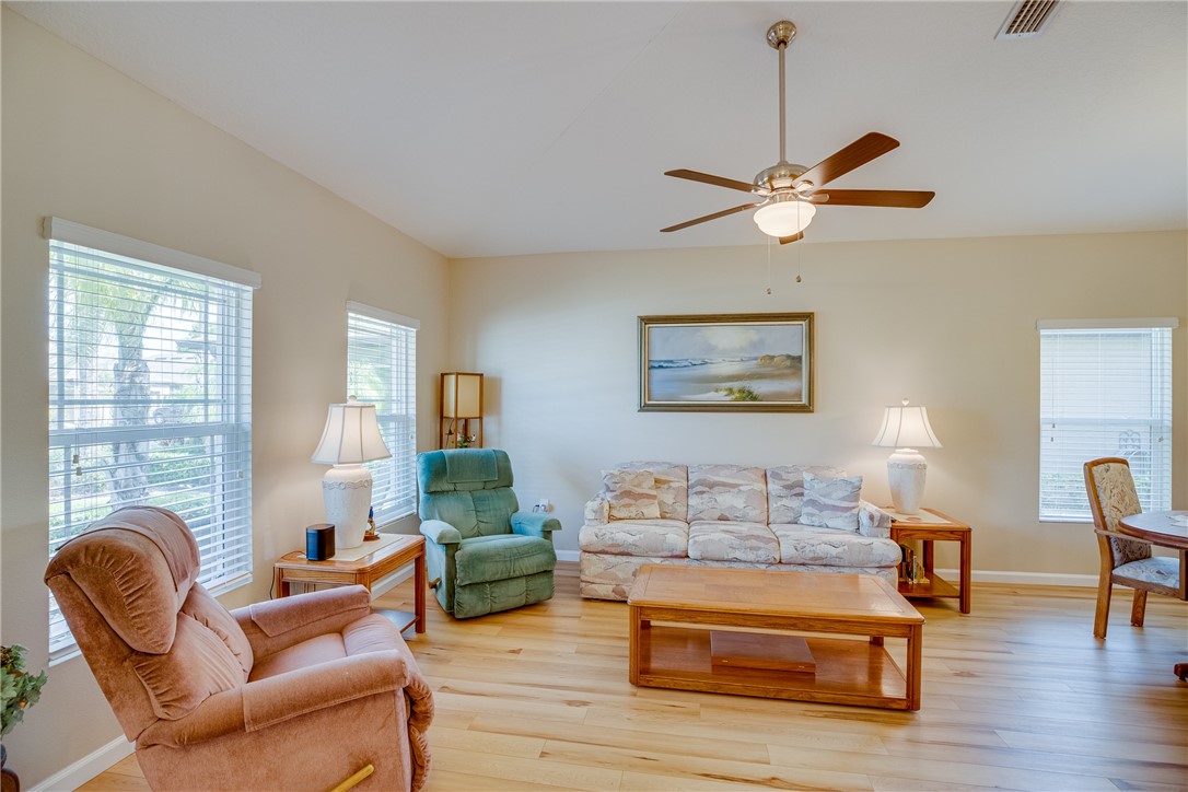 2965 Louetta Circle Melbourne, FL 32901 - Photo 4 of 36 a living room with furniture and a window