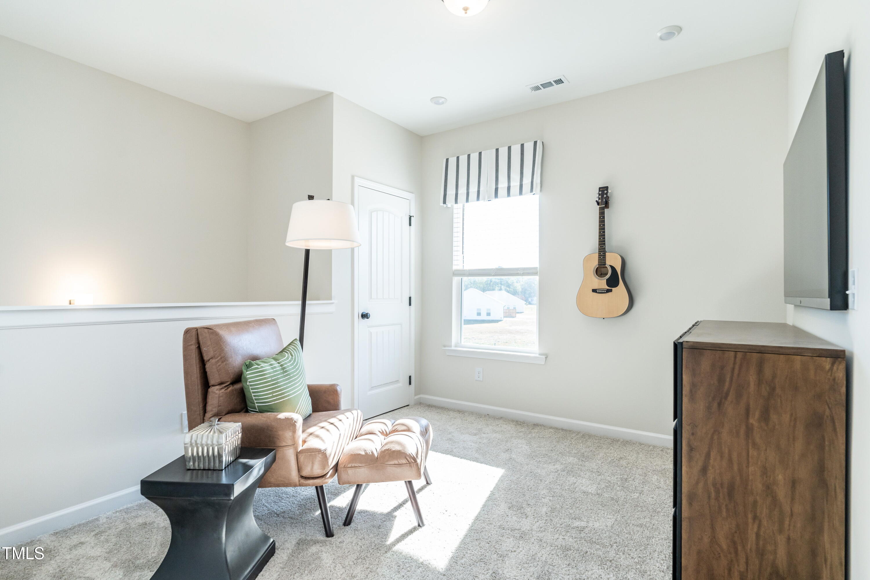 306 Deodora Lane Cameron, NC 28326 - Photo 12 of 27 a living room with furniture and a window