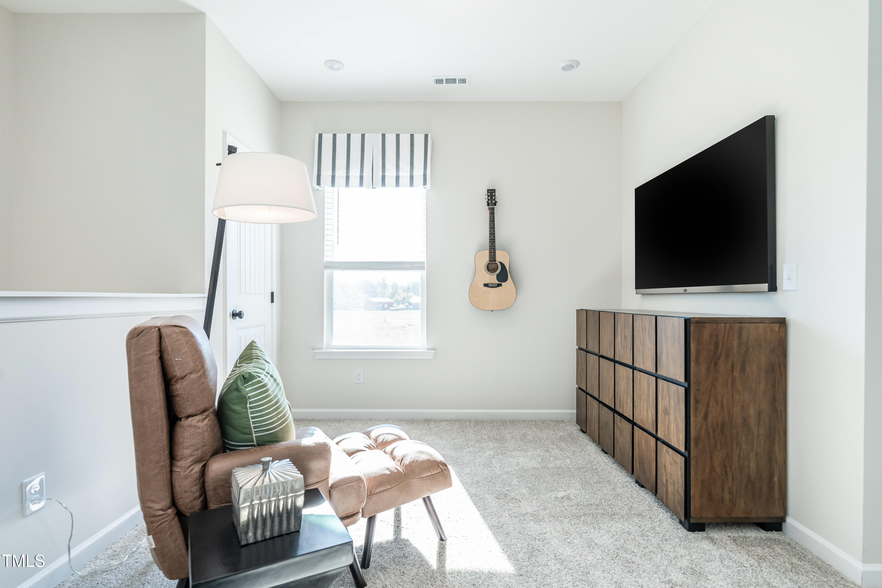 306 Deodora Lane Cameron, NC 28326 - Photo 13 of 27 a living room with furniture and a flat screen tv