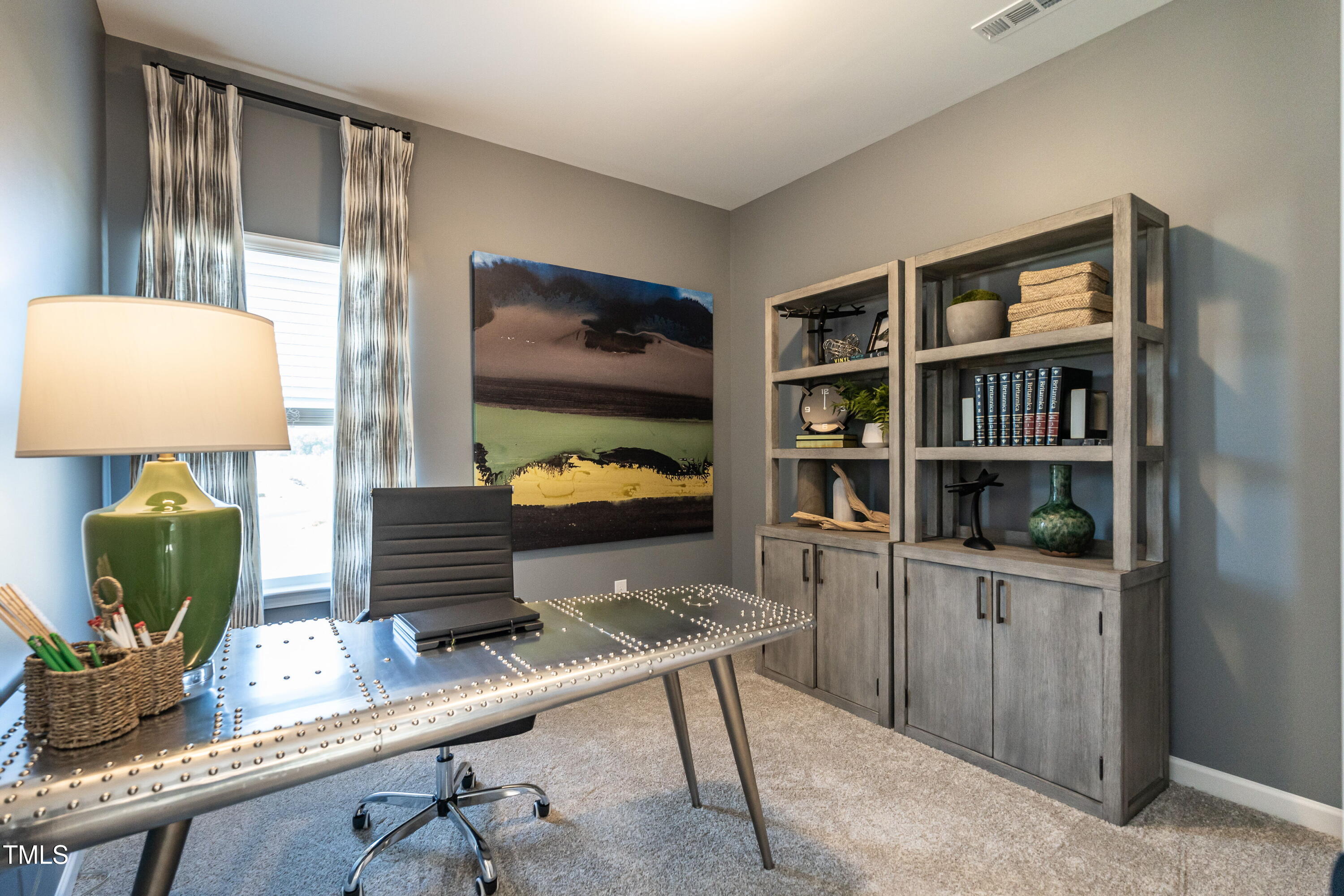 306 Deodora Lane Cameron, NC 28326 - Photo 21 of 27 a room with furniture and a book shelf