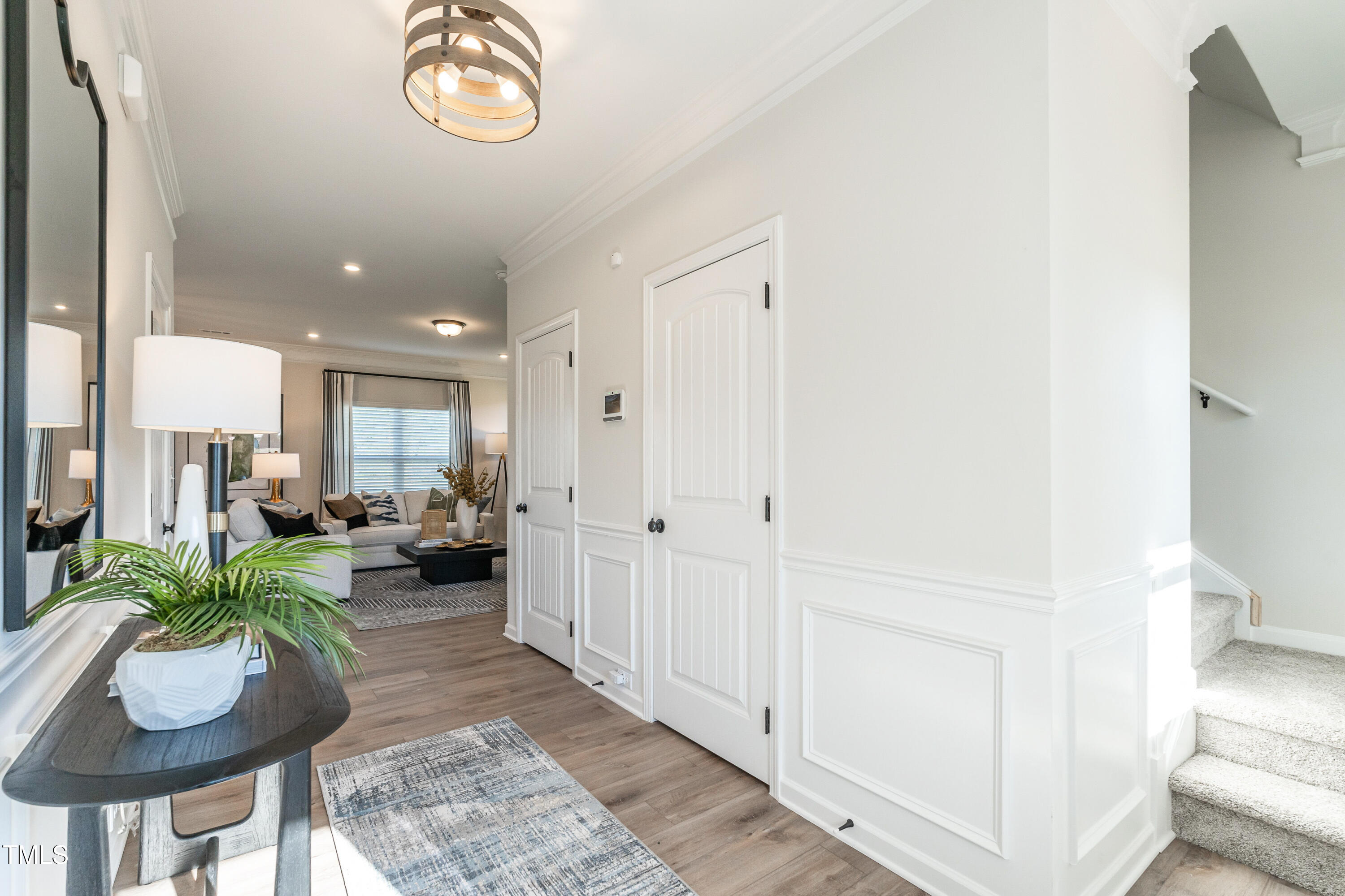 306 Deodora Lane Cameron, NC 28326 - Photo 5 of 27 a living room with furniture and a potted plant