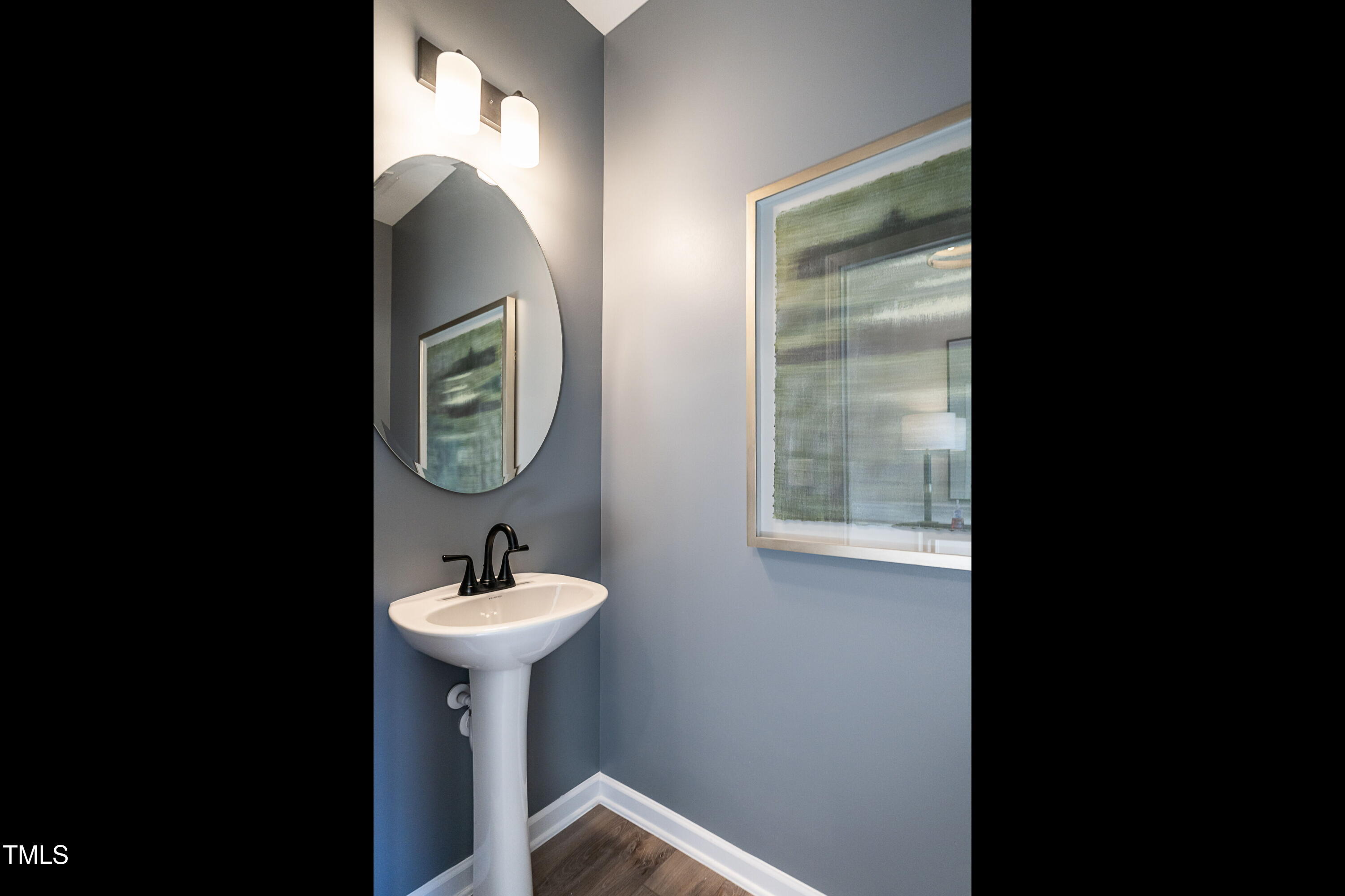 306 Deodora Lane Cameron, NC 28326 - Photo 6 of 27 a bathroom with a sink and a mirror