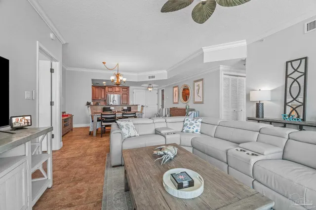 a kitchen with stainless steel appliances granite countertop a refrigerator and a stove