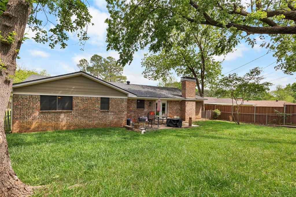 613 Edwards Drive Denison, TX 75020 - Photo 19 of 31 a front view of house with yard and green space