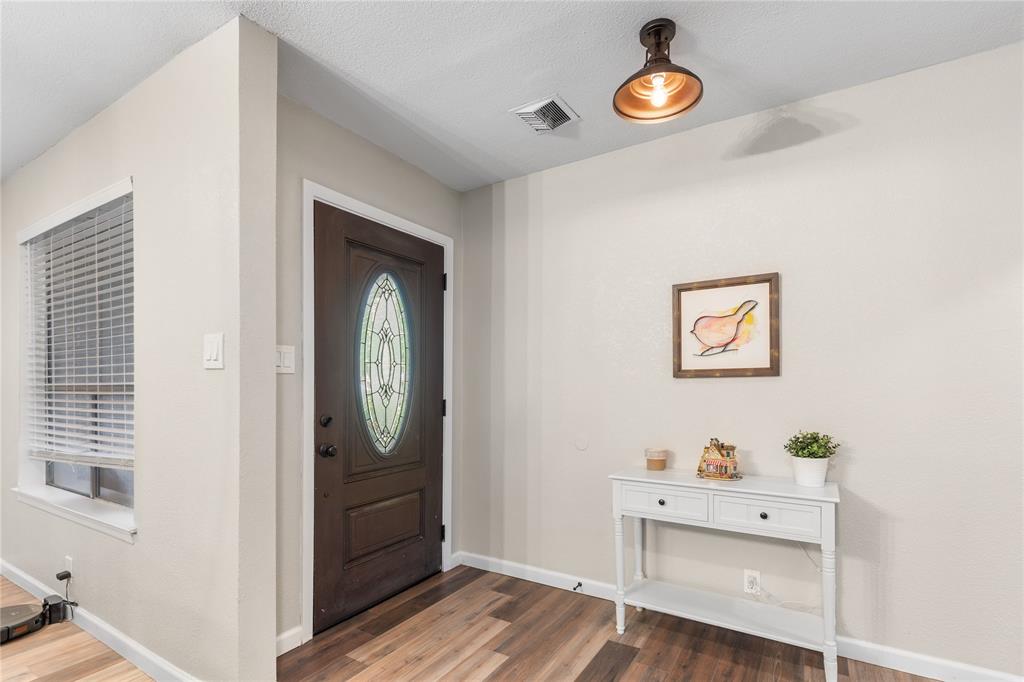 613 Edwards Drive Denison, TX 75020 - Photo 22 of 31 a view of an entryway with wooden floor