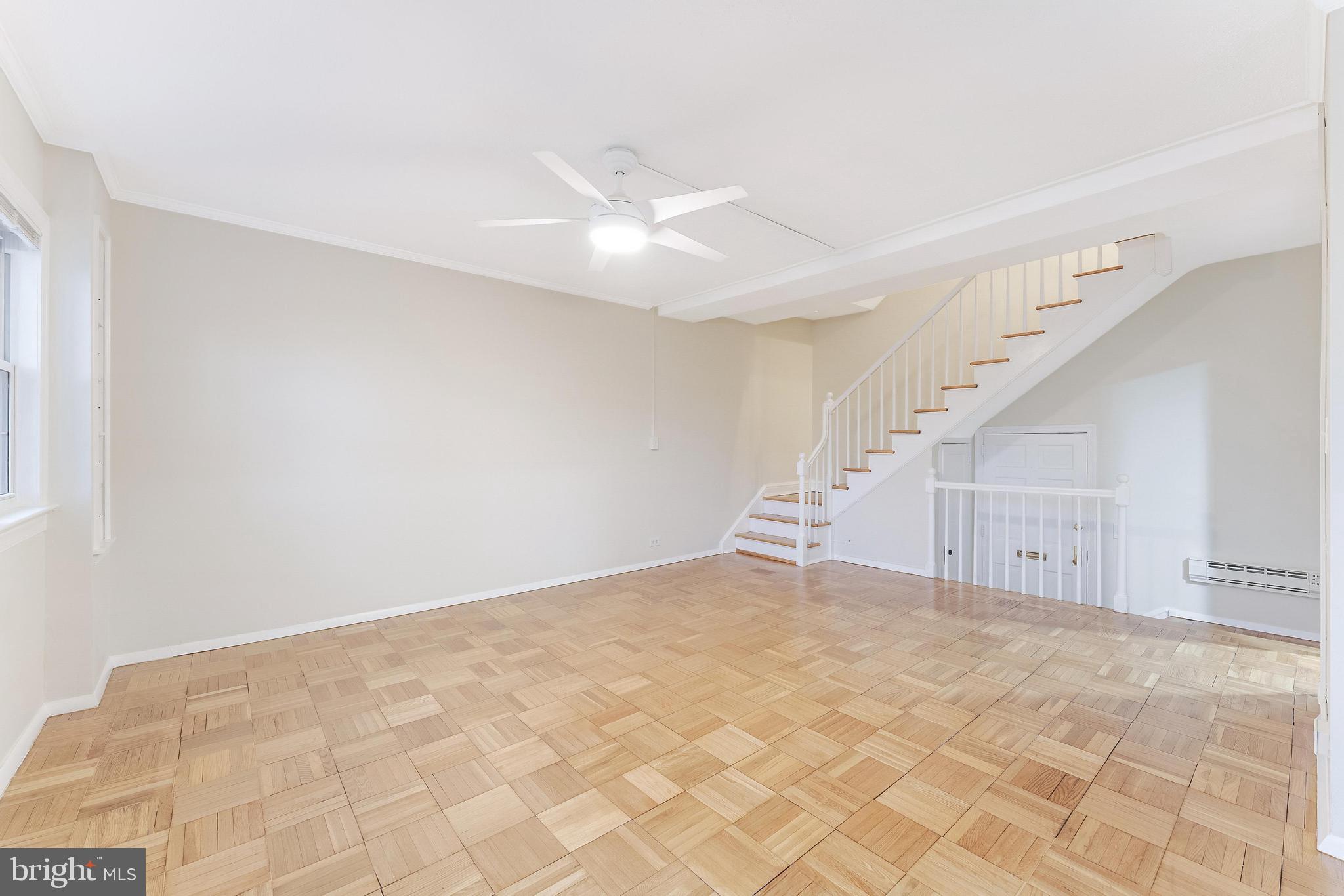 3228 Wellington Road Alexandria, VA 22302 - Photo 15 of 20 a view of an empty room with stairs