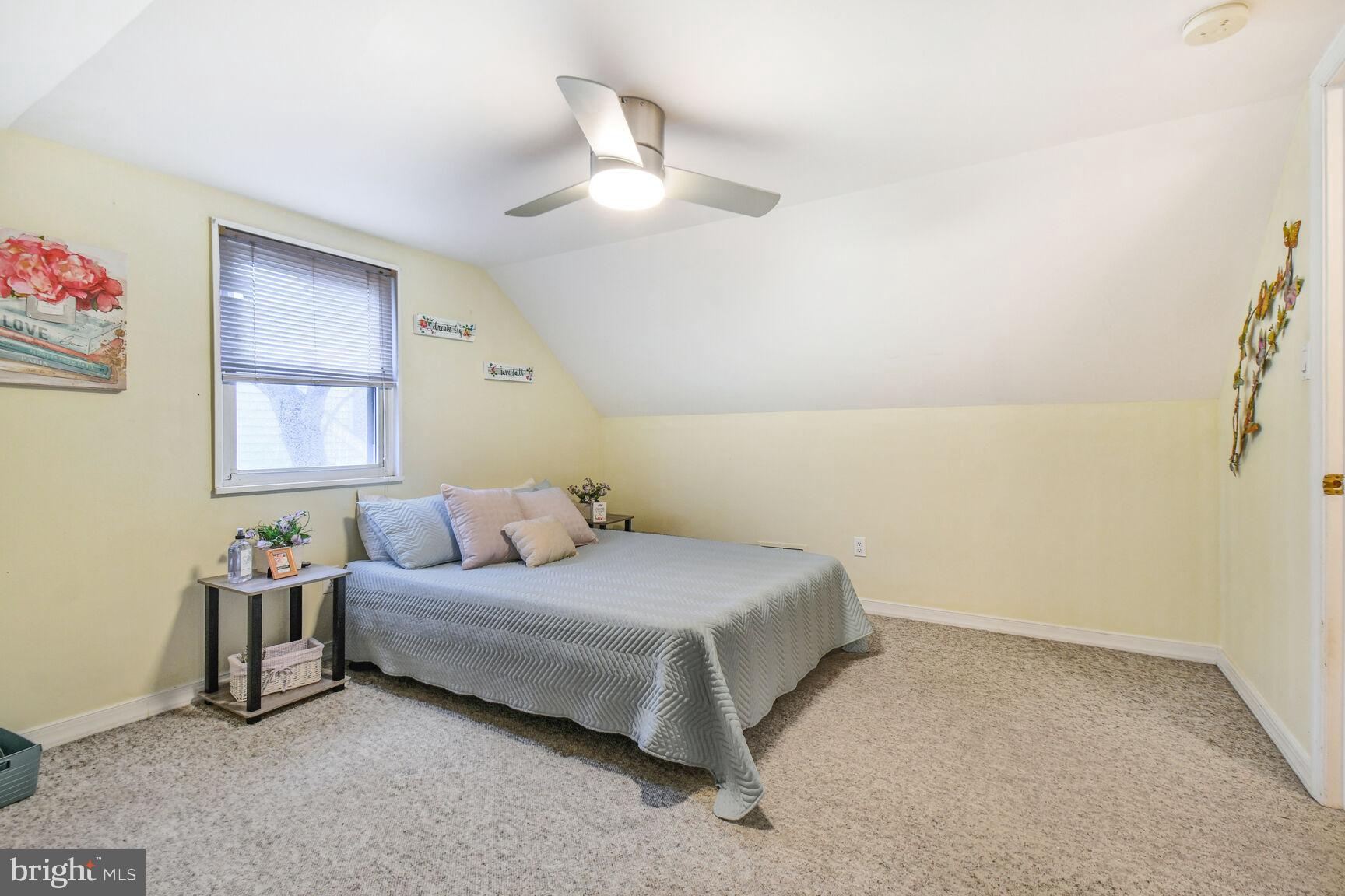 1002 Laredo Road Silver Spring, MD 20901 - Photo 12 of 70 a bedroom with a bed and a window