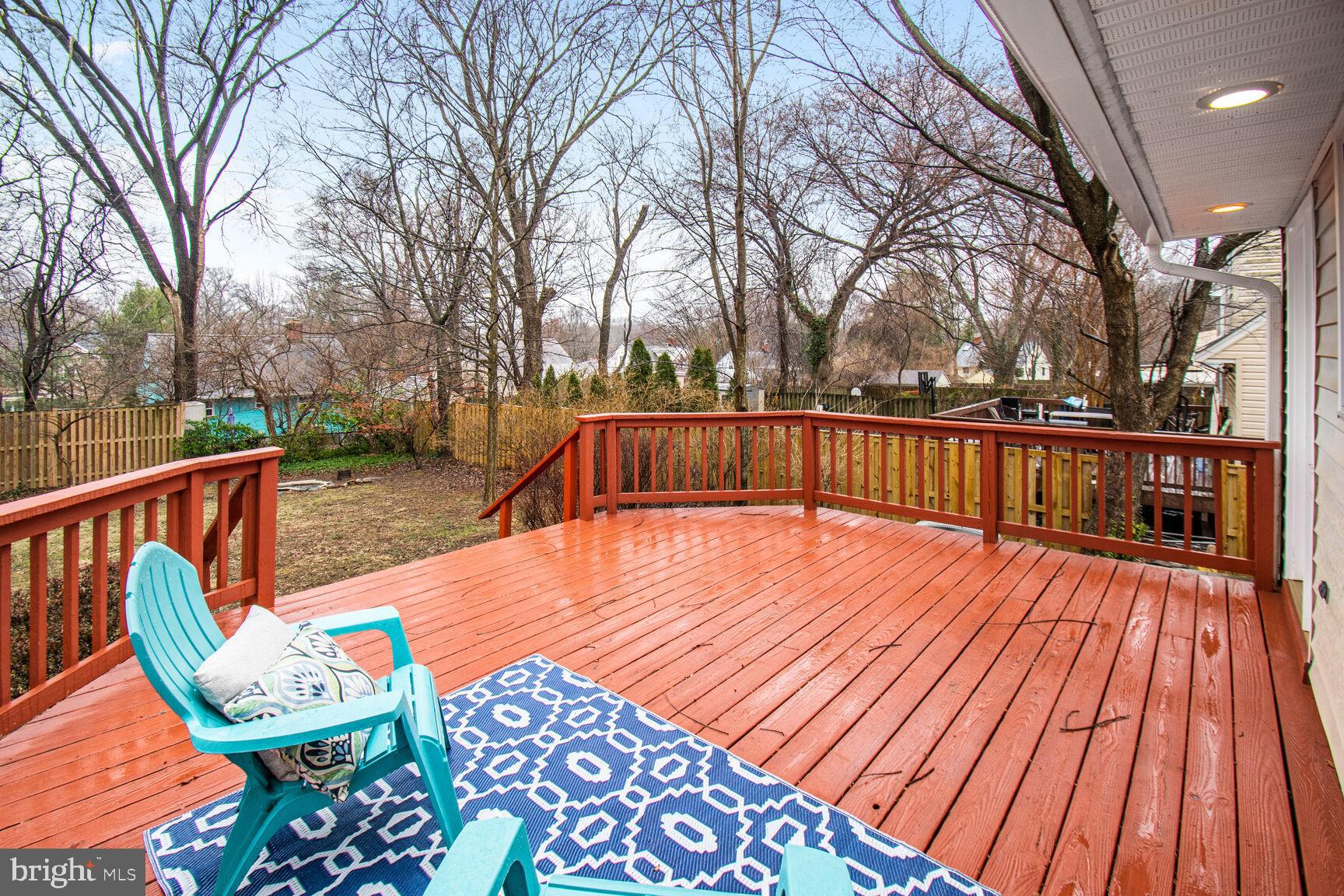 1002 Laredo Road Silver Spring, MD 20901 - Photo 18 of 70 a view of a wooden deck with furniture
