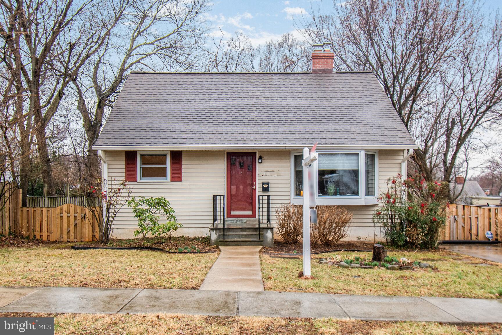 1002 Laredo Road Silver Spring, MD 20901 - Photo 2 of 70 a front view of a house with garden