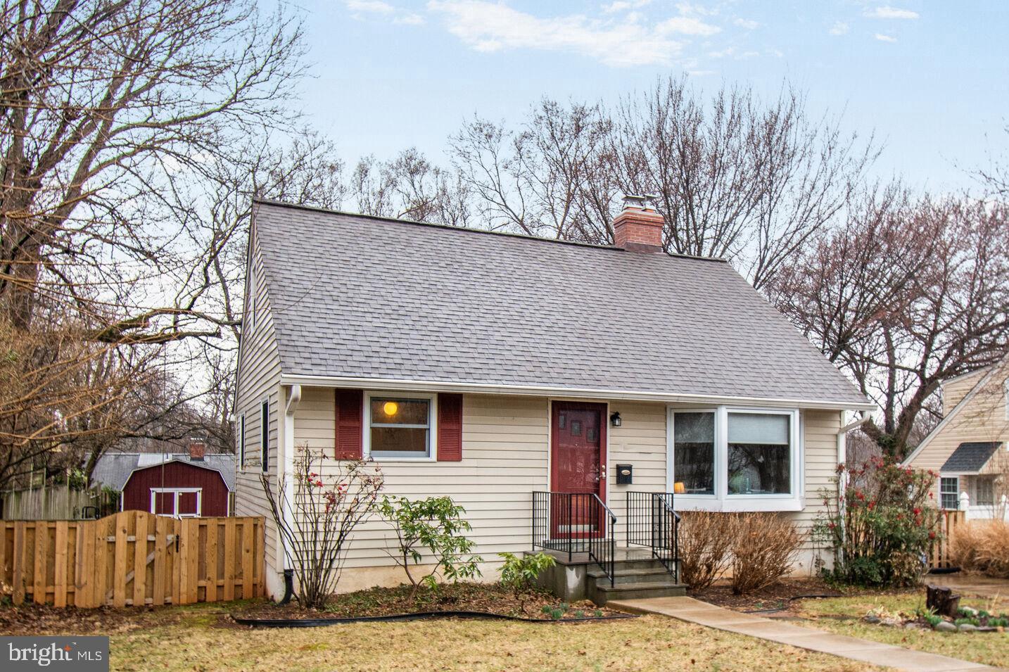 1002 Laredo Road Silver Spring, MD 20901 - Photo 21 of 70 a front view of a house with a yard