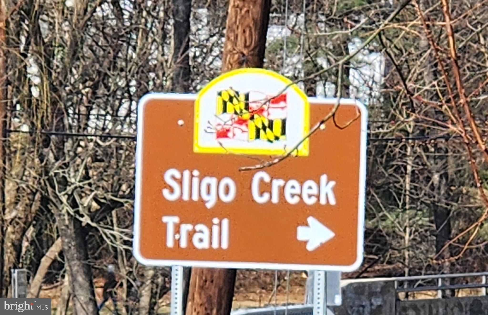 1002 Laredo Road Silver Spring, MD 20901 - Photo 28 of 70 a sign that is on a wooden wall