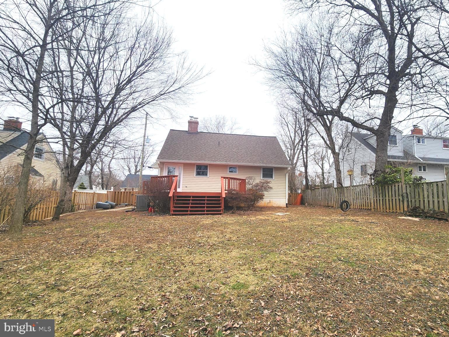 1002 Laredo Road Silver Spring, MD 20901 - Photo 47 of 70 a house that has a tree in front of it