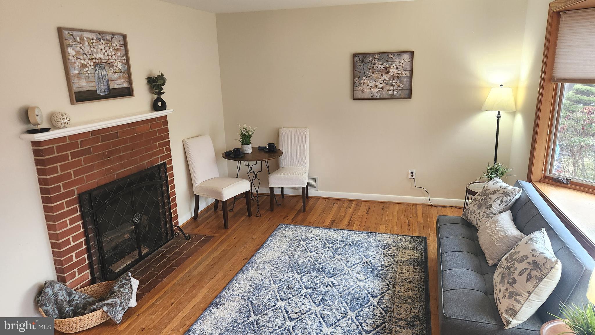 1002 Laredo Road Silver Spring, MD 20901 - Photo 57 of 70 a living room with furniture and a fireplace