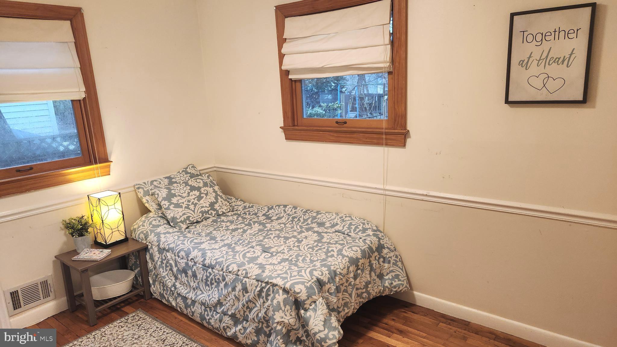 1002 Laredo Road Silver Spring, MD 20901 - Photo 63 of 70 a bedroom with a bed and a window