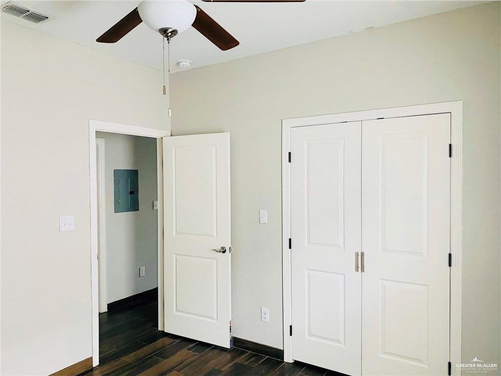 207 Fig Drive, Unit 2 Edinburg, TX 78541 - Photo 7 of 13 a view of a hallway with wooden floor