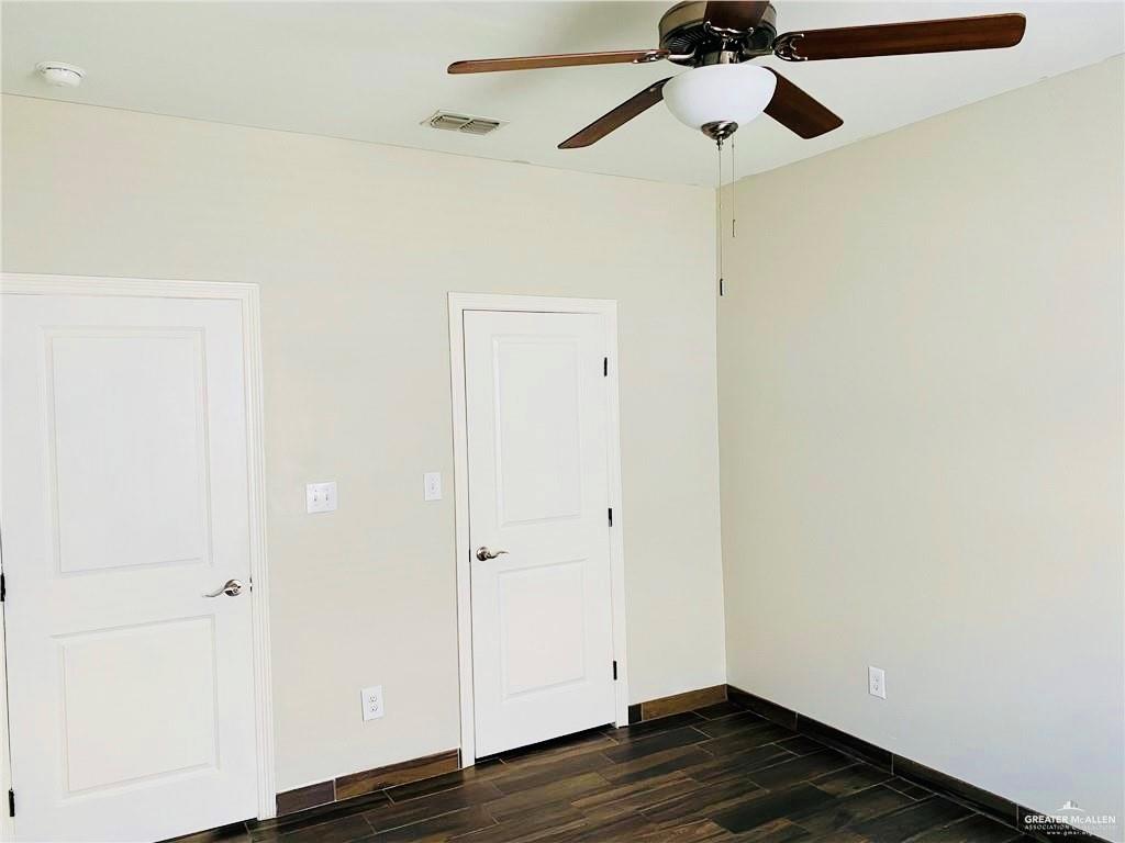 207 Fig Drive, Unit 2 Edinburg, TX 78541 - Photo 10 of 13 a view of a room with wooden floor