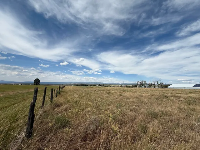 a view of a lake with a big yard