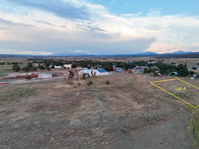 a view of a road with an ocean view