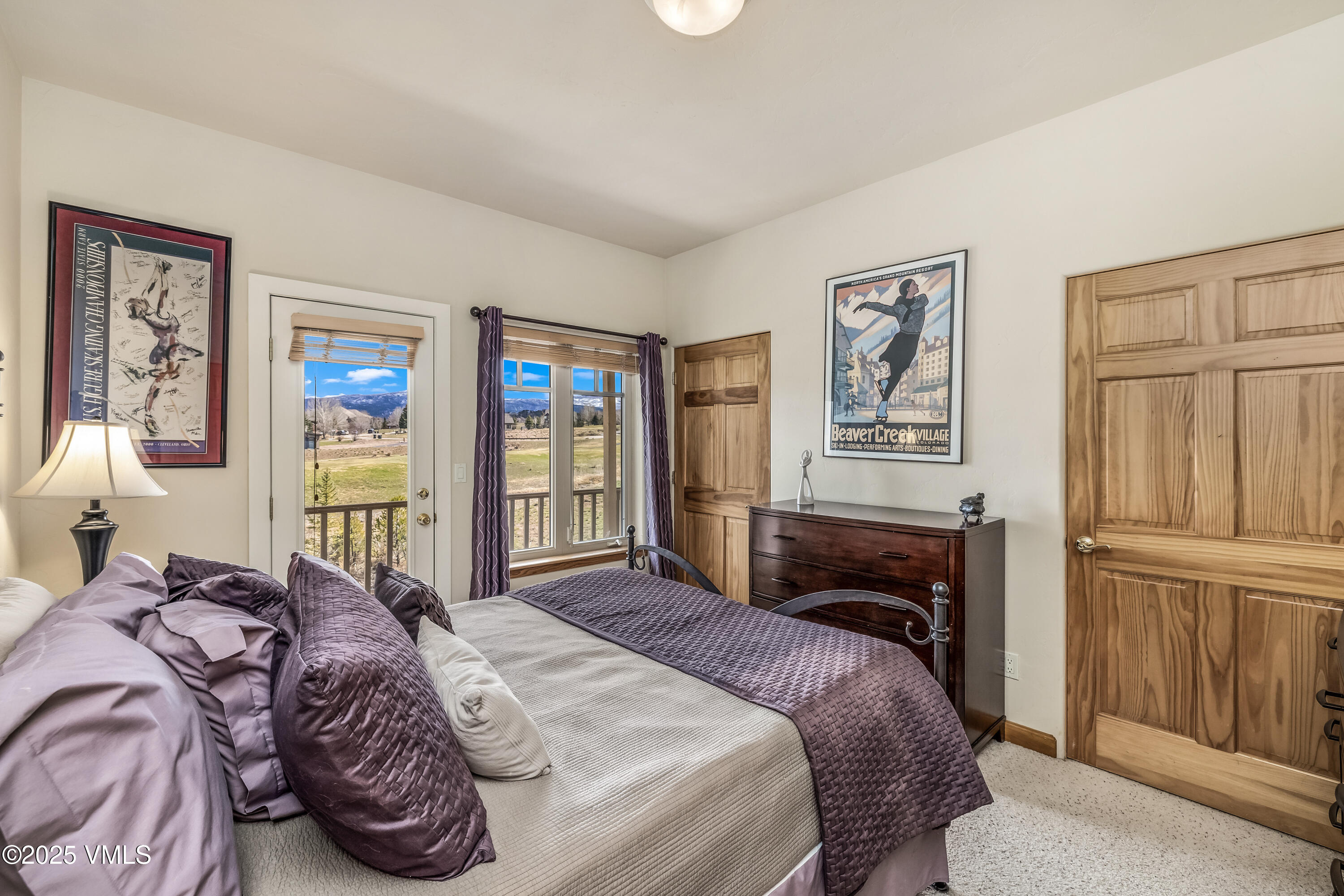 111 East Double Hitch Eagle, CO 81631 - Photo 19 of 38 a bedroom with a bed and wooden floor