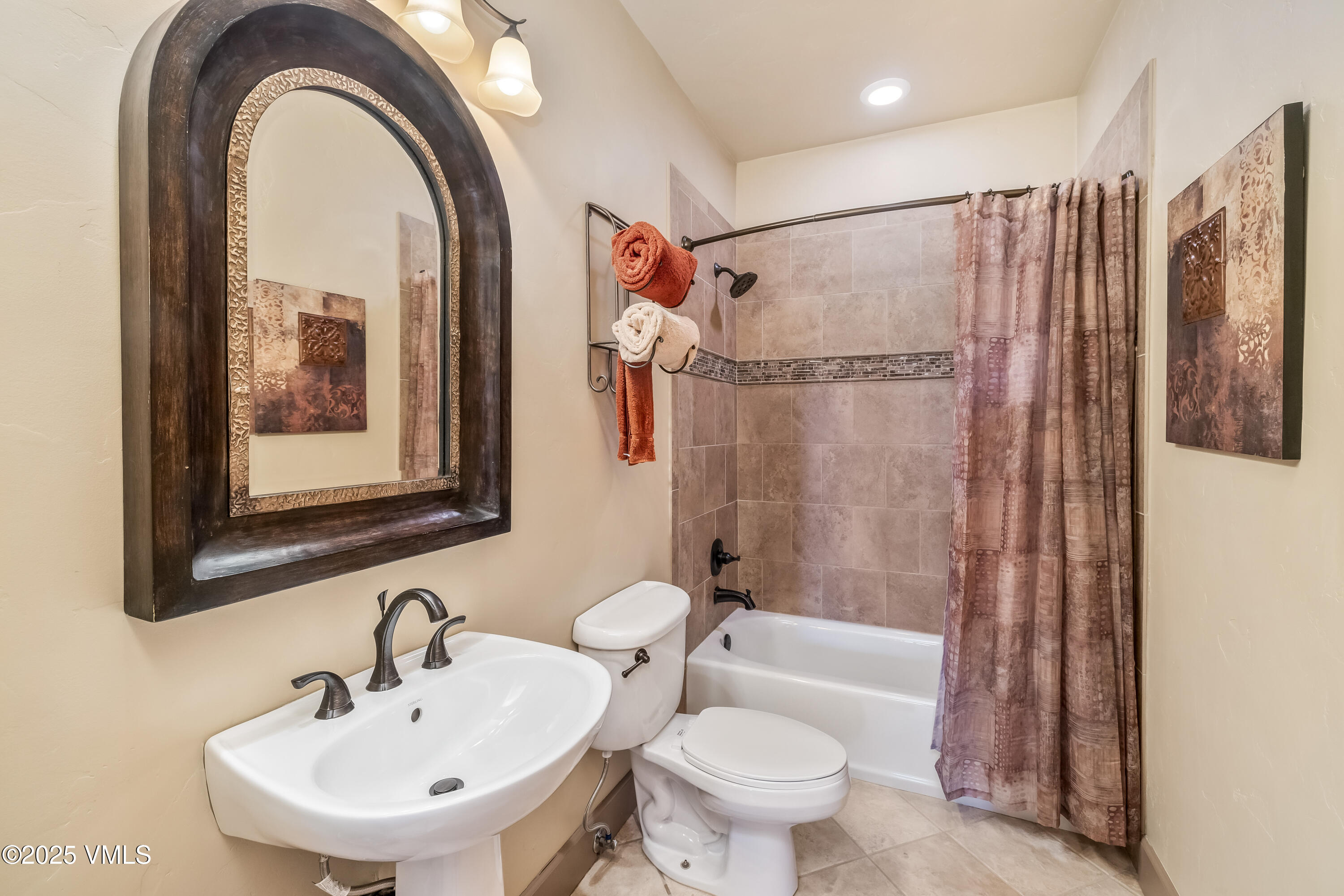 111 East Double Hitch Eagle, CO 81631 - Photo 27 of 38 a bathroom with a toilet sink and shower