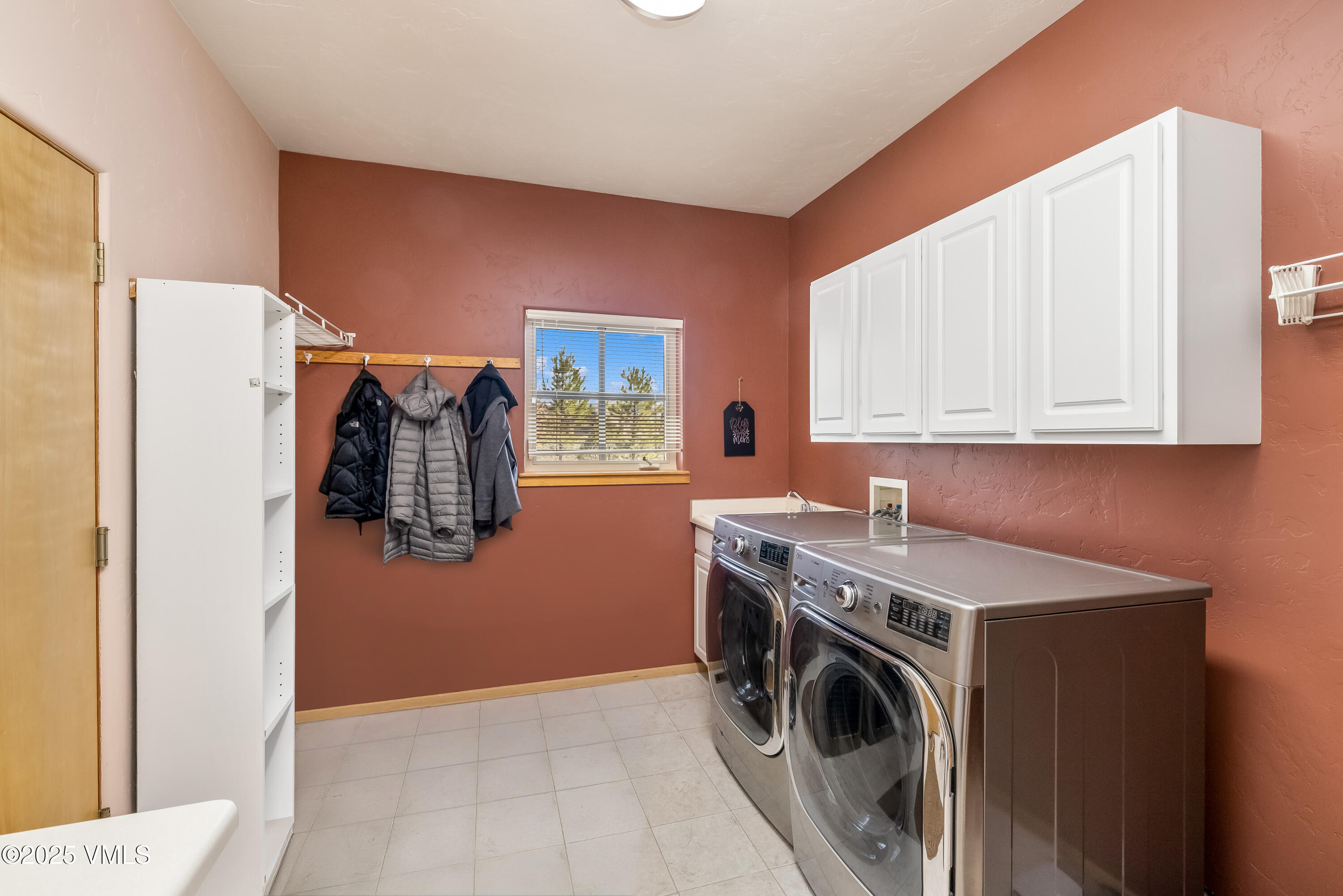 111 East Double Hitch Eagle, CO 81631 - Photo 32 of 38 a utility room with dryer and washer
