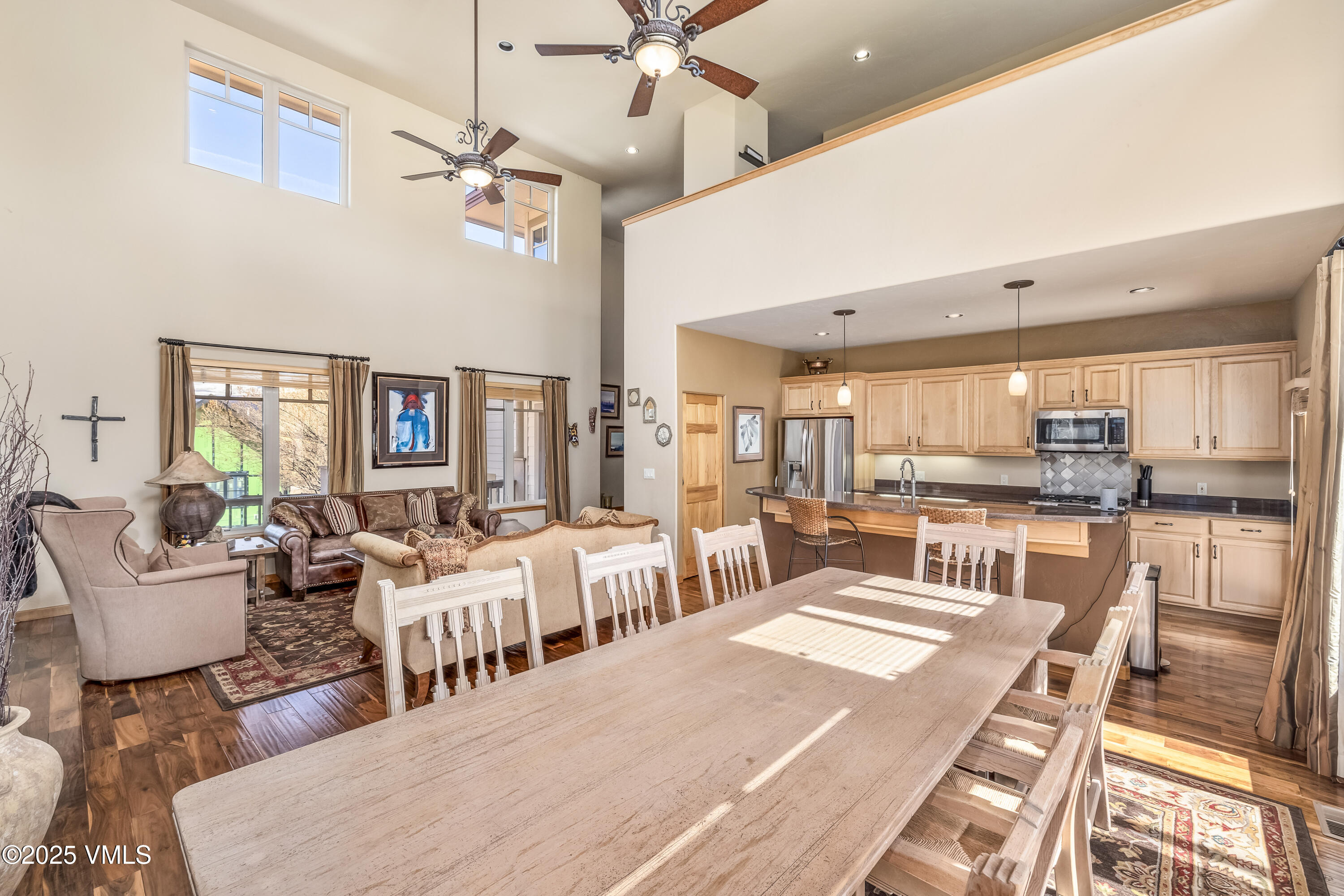 111 East Double Hitch Eagle, CO 81631 - Photo 8 of 38 a living room with lots of white furniture and a table