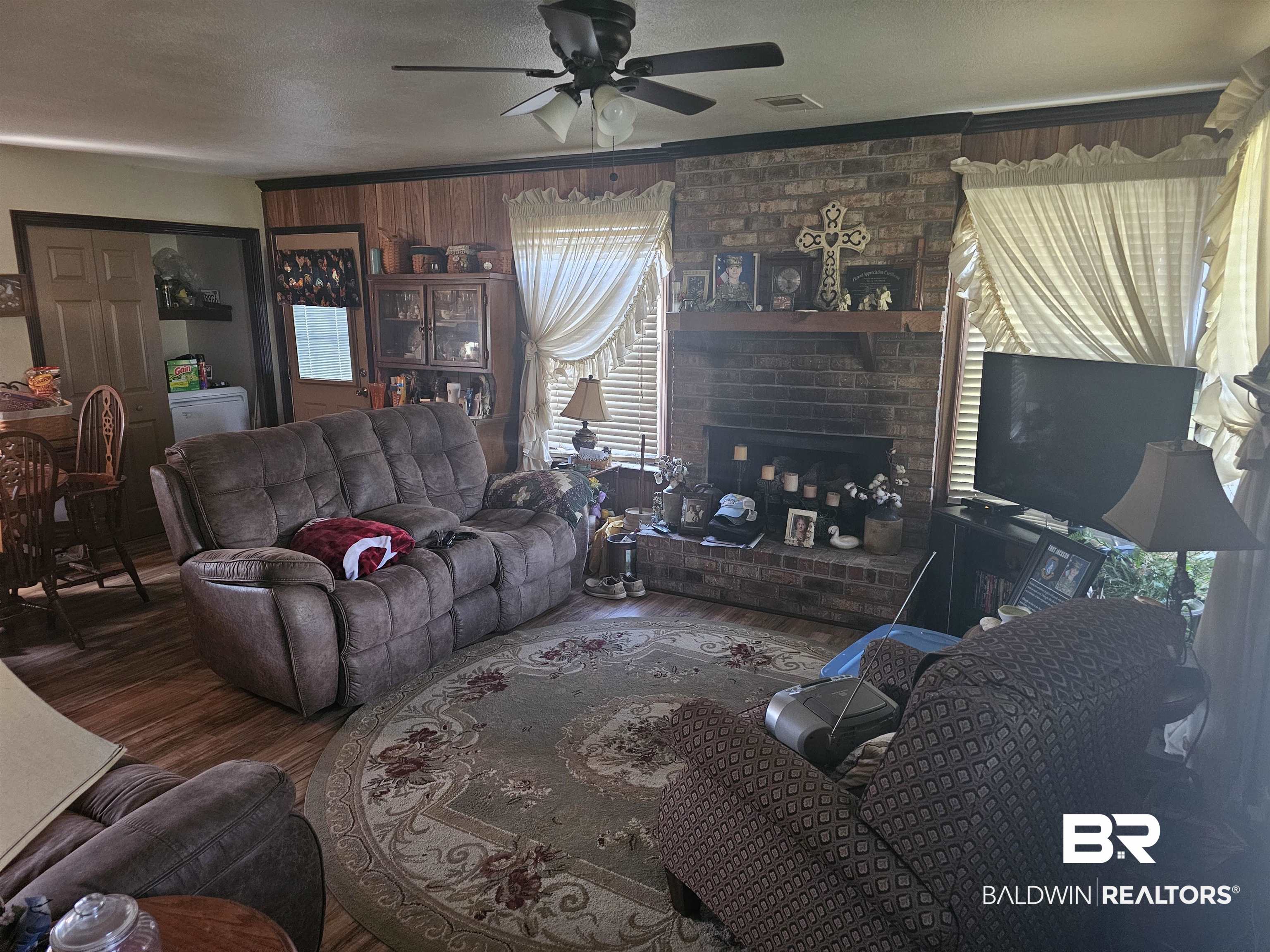 1818 Old Fannie Road Flomaton, AL 36441 - Photo 10 of 20 Living room featuring wood finished floors and ceiling fan