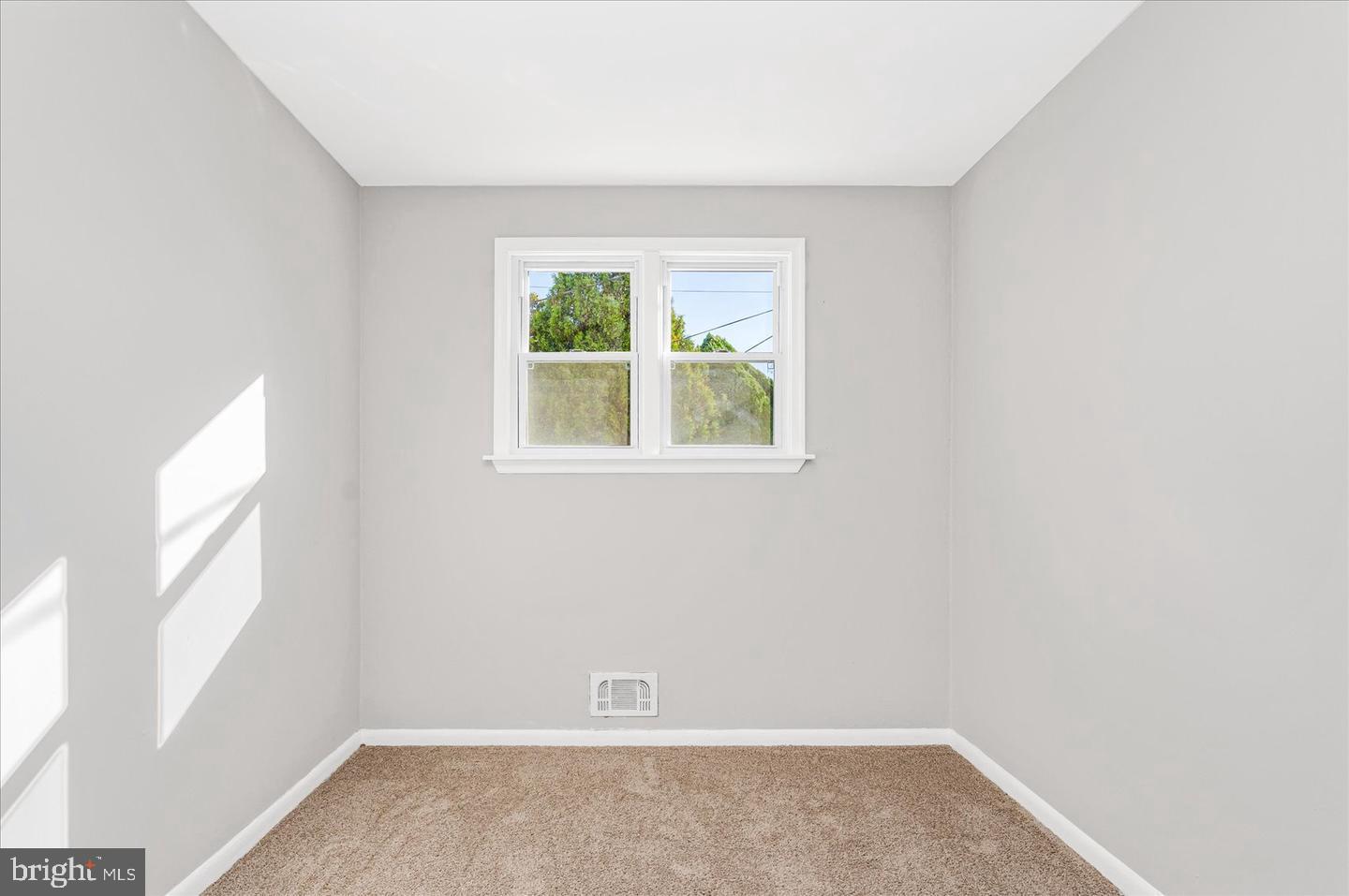 4609 Tema Road Pikesville, MD 21208 - Photo 12 of 36 an empty room with a window