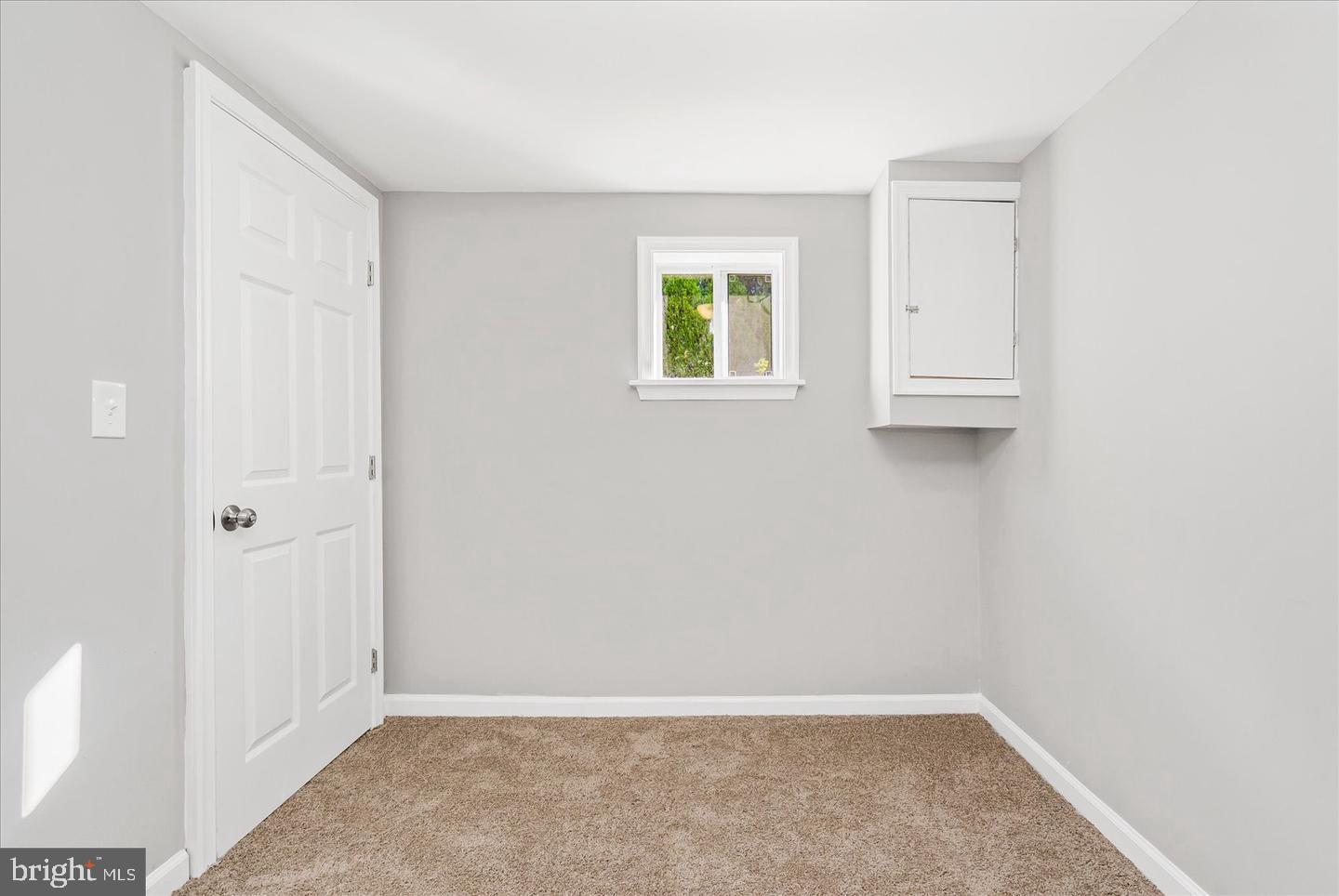 4609 Tema Road Pikesville, MD 21208 - Photo 15 of 36 a view of an empty room with window