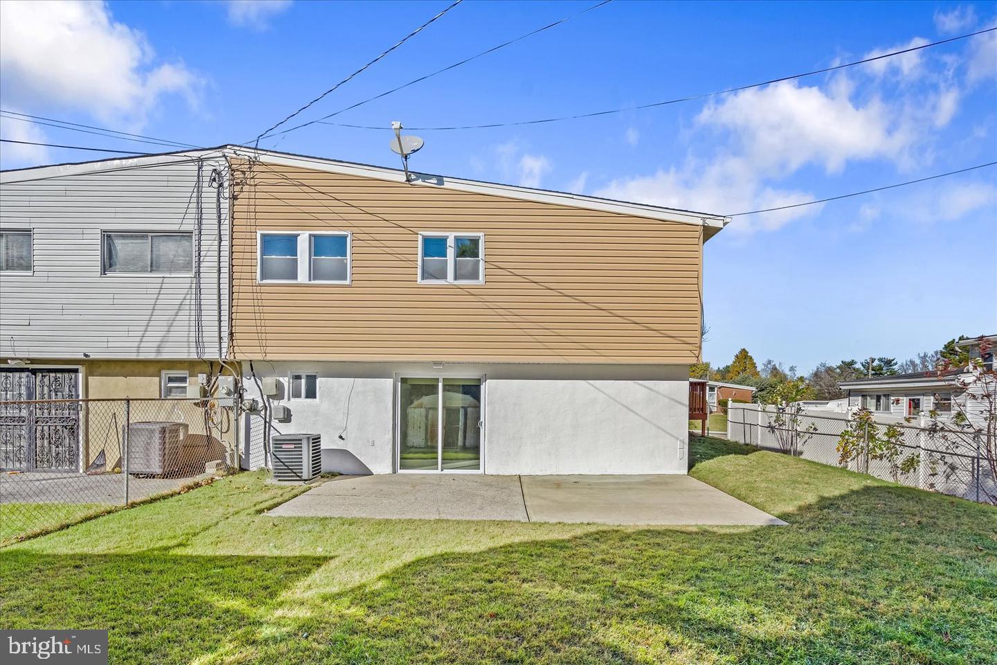 4609 Tema Road Pikesville, MD 21208 - Photo 19 of 36 a view of a house with a yard