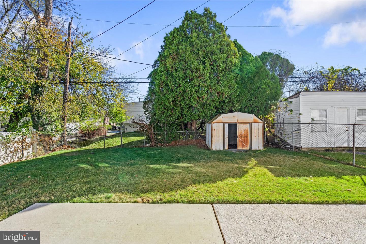 4609 Tema Road Pikesville, MD 21208 - Photo 20 of 36 a view of a back yard of the house