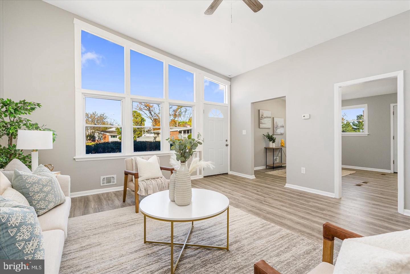 4609 Tema Road Pikesville, MD 21208 - Photo 4 of 36 a living room with furniture and wooden floor