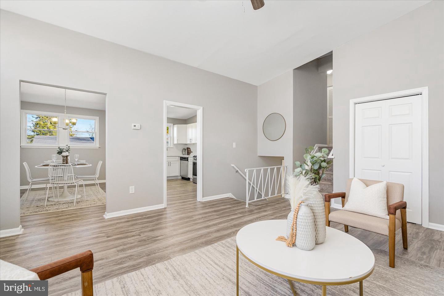 4609 Tema Road Pikesville, MD 21208 - Photo 6 of 36 a living room with furniture and a table