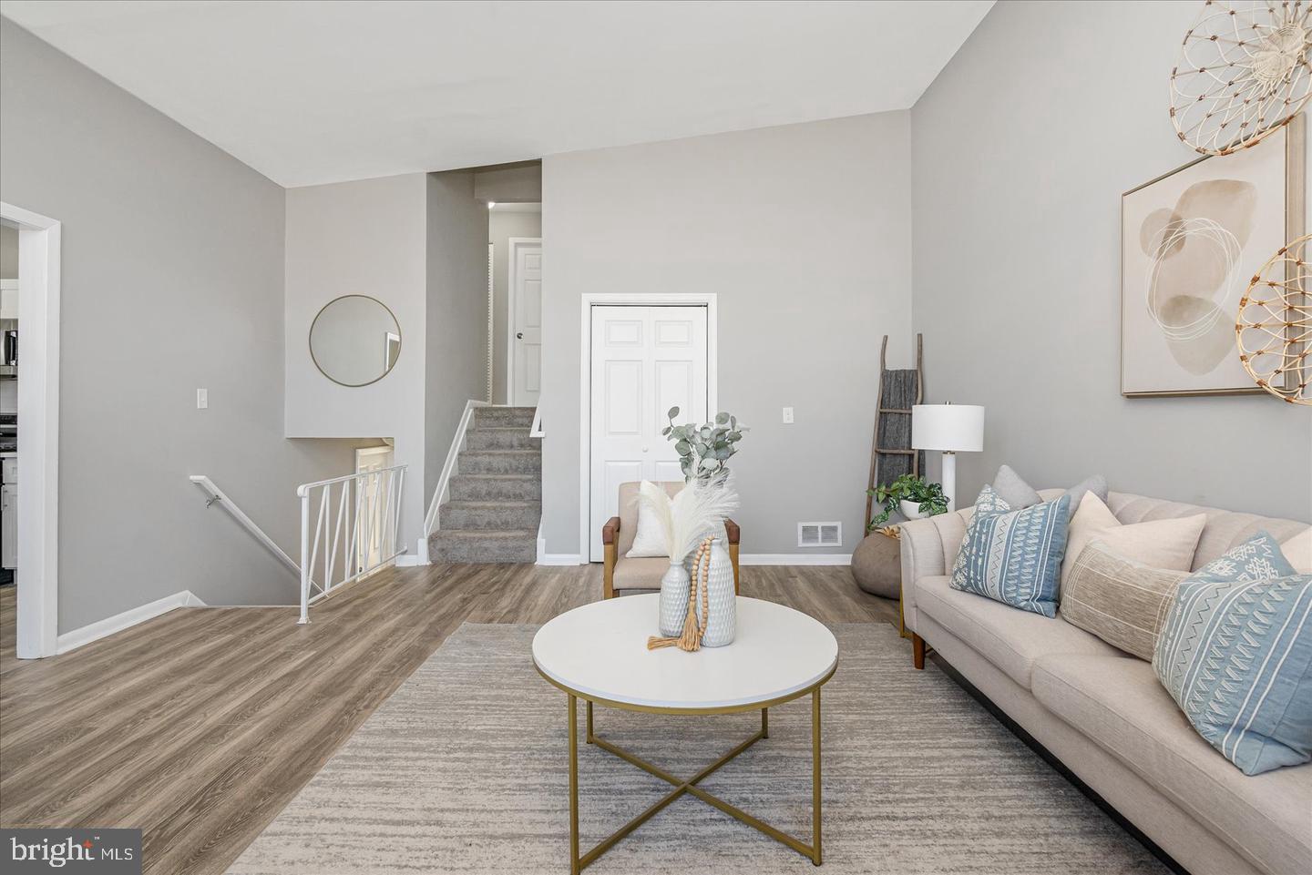 4609 Tema Road Pikesville, MD 21208 - Photo 7 of 36 a living room with furniture and a wooden floor