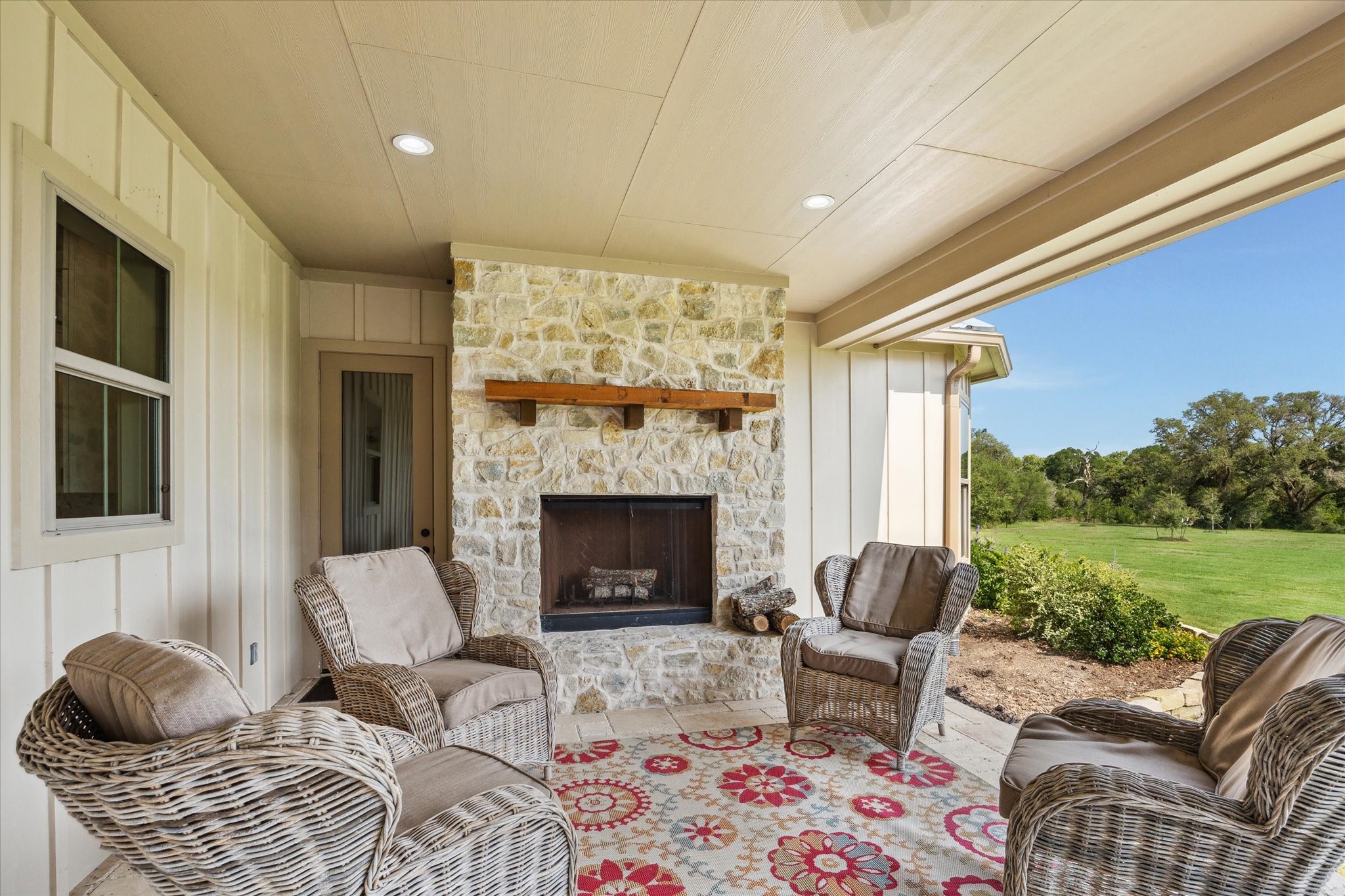 2130 Hartfield Road Round Top, TX 78954 - Photo 3 of 35 a living room with furniture and a fireplace