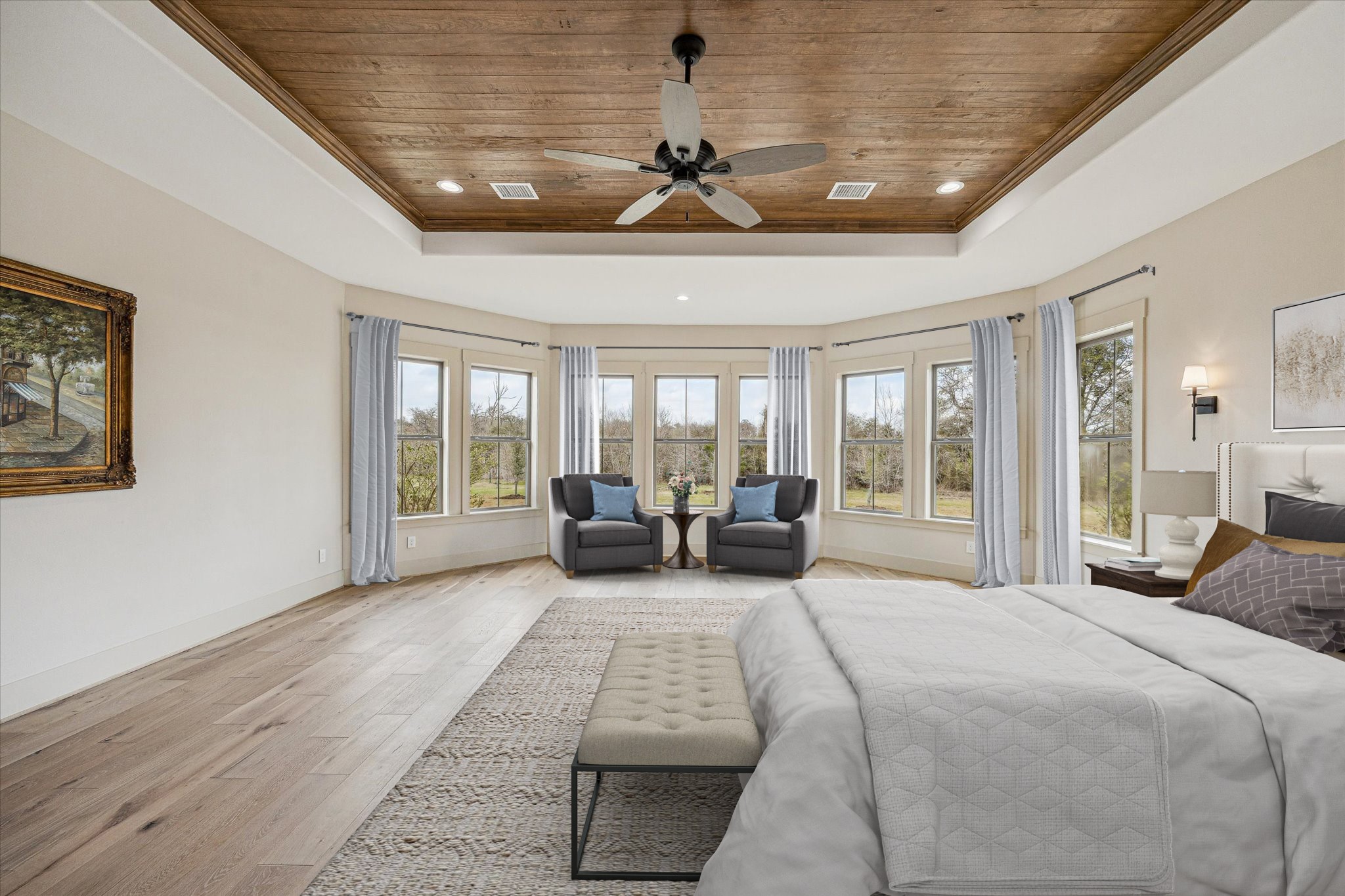 2130 Hartfield Road Round Top, TX 78954 - Photo 33 of 35 a spacious bedroom with a large bed couch and a window