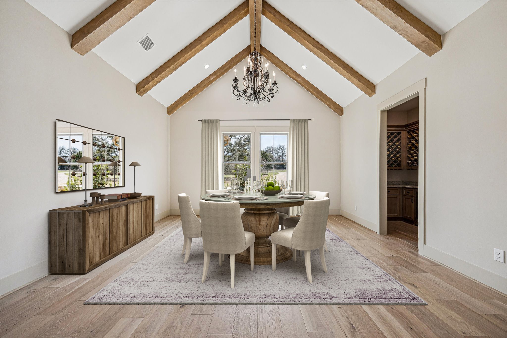 2130 Hartfield Road Round Top, TX 78954 - Photo 9 of 35 a view of a dining room with furniture window and wooden floor