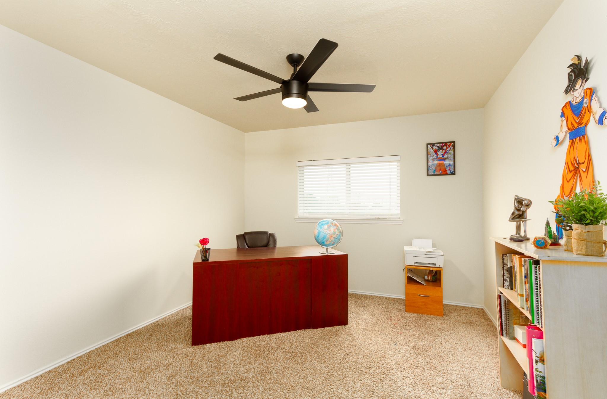 1107 Arum Road Missouri City, TX 77489 - Photo 17 of 23 Bedroom 3 is currently being used as an office space, complete with ceiling, nice closet space and backyard views.
