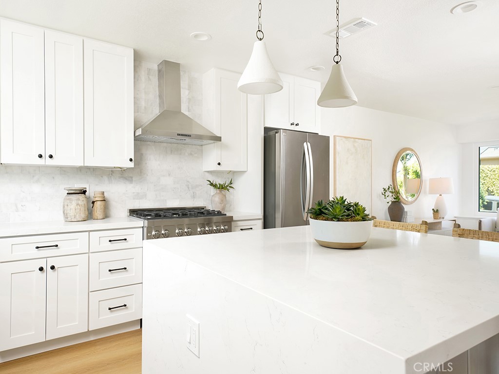33271 Ocean Hill Drive Dana Point, CA 92629 - Photo 17 of 43 a kitchen with sink a stove and cabinets